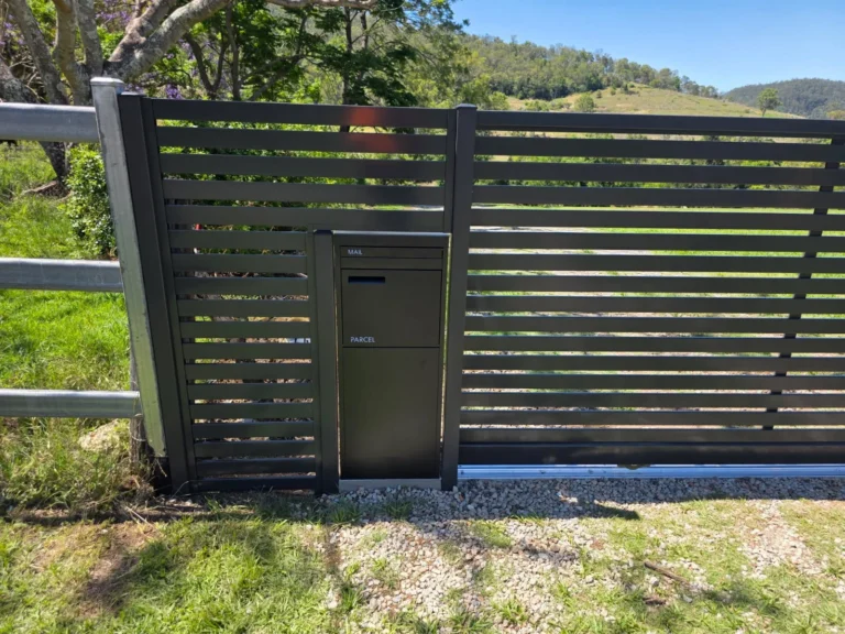 Horizontal slat fence panel with built-in letterbox