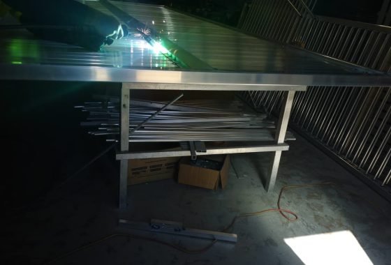 Welding a custom slat gate in the Deception Bay workshop